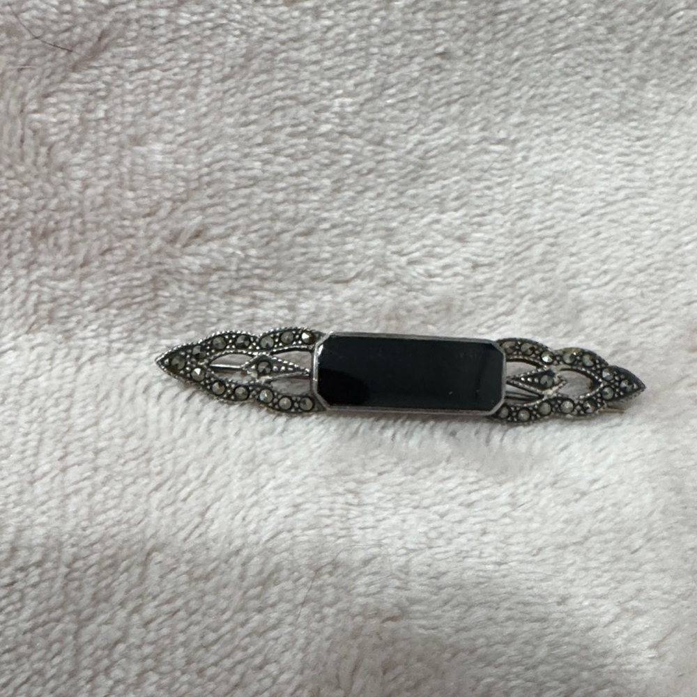 Elegant Black and Silver Brooch